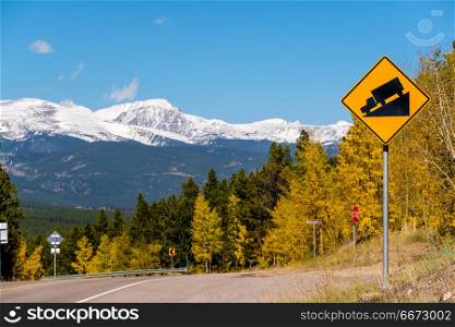 Steep grade truck road sign on highway . Steep grade truck road sign on highway at autumn sunny day in Colorado, USA.