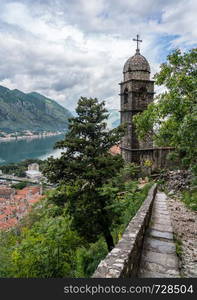 Steep pathway by Church of our Lady of Remedy above old town Kotor in Montenegro. Step path by church above Old Town of Kotor in Montenegro