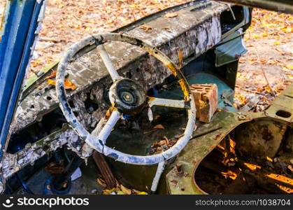Steering wheel detail of an old abandoned truck