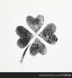 Stenciled four-leaf Irish clover - graffiti style raster illustration