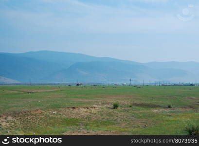 Steppe on a background of mountains .Barguzin valley,Buryatia, Russia.