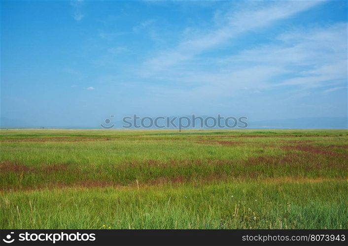 Steppe on a background of mountains .Barguzin valley,Buryatia, Russia.