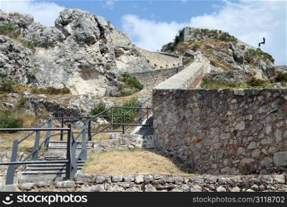 Steps and walls of old fortress on the rock in Knin