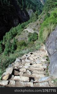 Steps down the footpath n mountain in Nepal