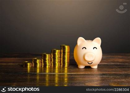 Steps made of coins and a piggy bank. Accumulation of savings. Increasing interest rate on deposits. Loyalty program. Saving money for retirement and pension. Increasing profitability. Economy