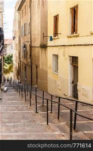 Steps up a steep street in the Old Port area of Marseille, France