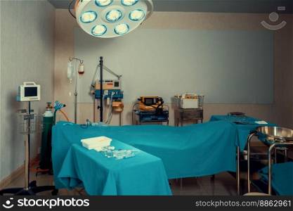 Sterile operation room in the hospital display sets of medical surgical equipments arranged on the table. Surgery room with surgical tools background for medical purpose.