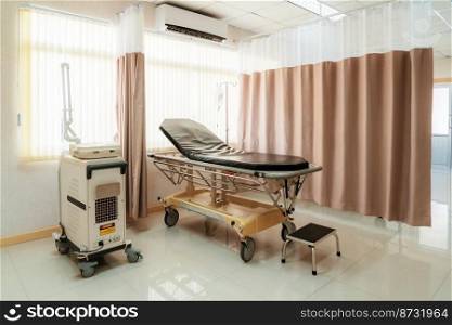 Sterile recovery room equipped with comfortable modern medical sickbed for patient recovery. Photo of a hospital bedroom or ward for patient treatment for medical usage.. Sterile recovery room equipped with comfortable sickbed for patient recovery.