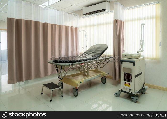 Sterile recovery room equipped with comfortable modern medical sickbed for patient recovery. Photo of a hospital bedroom or ward for patient treatment for medical usage.. Sterile recovery room equipped with comfortable sickbed for patient recovery.