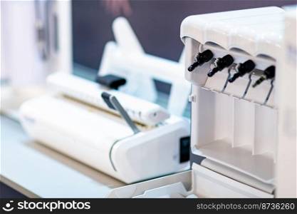 Sterilization desk with autoclave in a dental clinic. Sterilization of dental medicine instruments. . Sterilization desk with autoclave in a dental clinic.  