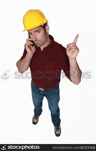 Stern foreman wagging his finger