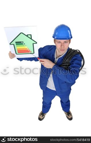 Stern tradesman giving a property an energy efficiency rating of G