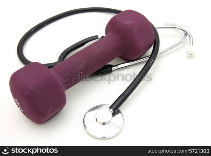 Stethoscope and dumbbell training weights together to conceptualize a healthy lifestyle.