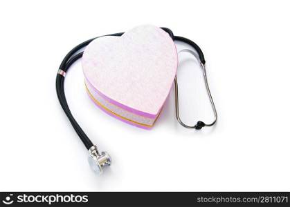 Stethoscope and gift box isolated on white