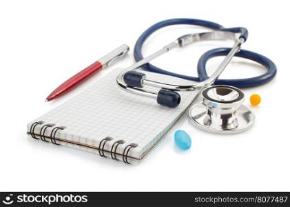 stethoscope and notebook isolated on white background