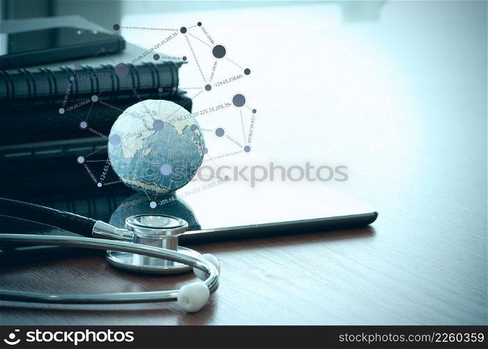 stethoscope and texture globe with digital tablet with socia media diagram as medical network concept