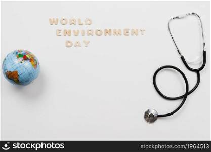 stethoscope globe with word environment day text. High resolution photo. stethoscope globe with word environment day text. High quality photo