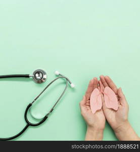 stethoscope hands with miniature lungs. Resolution and high quality beautiful photo. stethoscope hands with miniature lungs. High quality and resolution beautiful photo concept