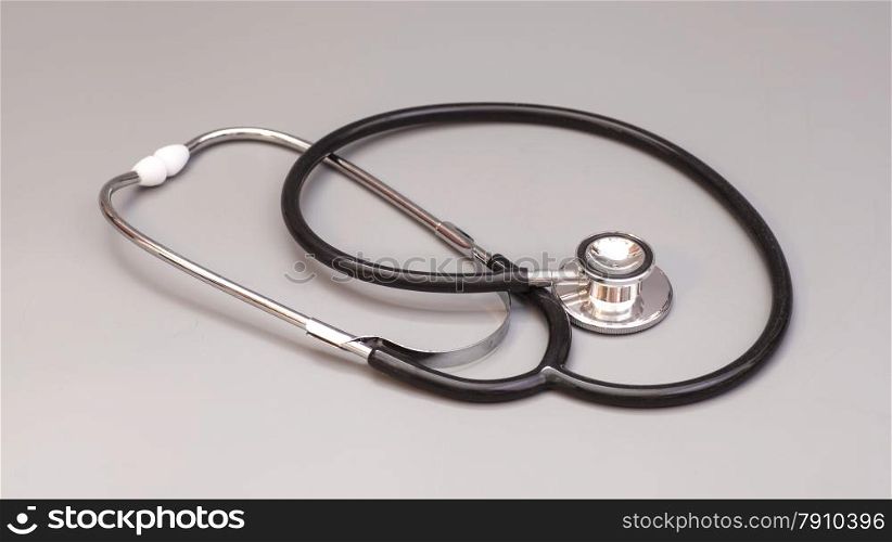stethoscope isolated on grey background