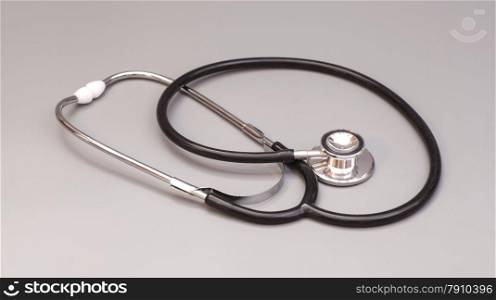 stethoscope isolated on grey background