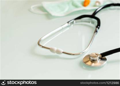 stethoscope mask and medicine, healthcare accessories with copy space on white background