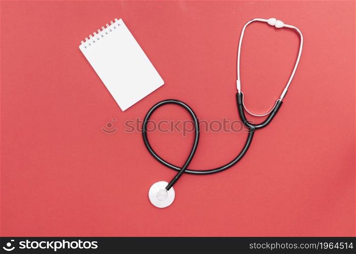 stethoscope near notebook. High resolution photo. stethoscope near notebook. High quality photo