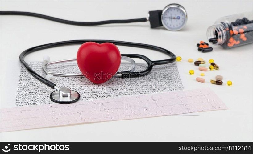 Stethoscope on cardiogram and toy heart. Concept healthcare. Cardiology - care of the heart. cardiology, heart care
