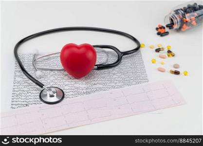 Stethoscope on cardiogram and toy heart. Concept healthcare. Cardiology - care of the heart. cardiology, heart care