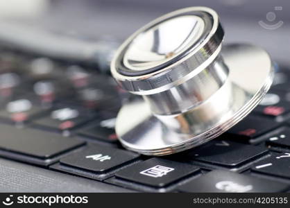 stethoscope on the laptop keyboard
