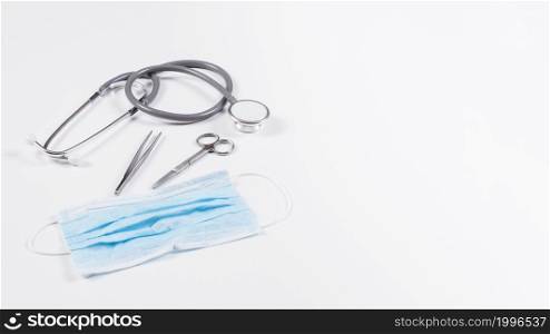 stethoscope surgical equipments white backdrop