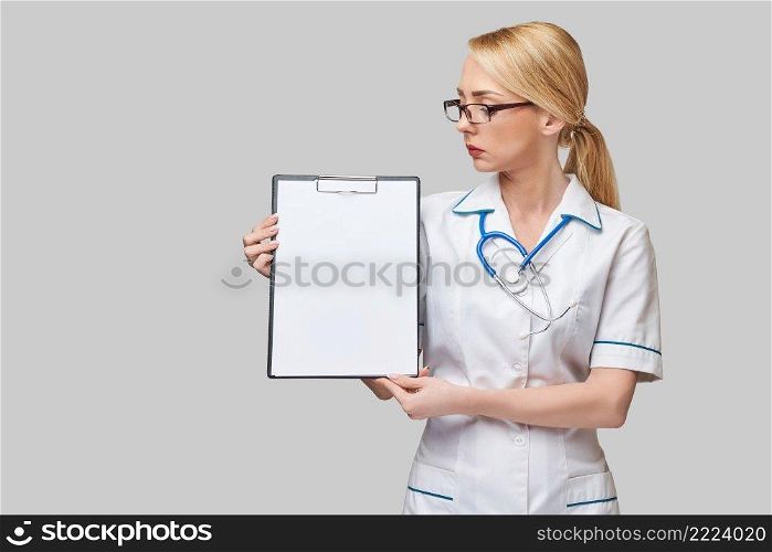 Stethoscope, syringe and&oules with medicines or vaccine over blue background.. Stethoscope, syringe and&oules with medicines or vaccine over blue background