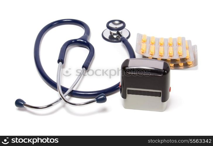 stethoscope, tablets and doctor seal isolated on white background