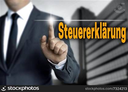 steuererklaerung (in german tax declaration) touchscreen is operated by businessman