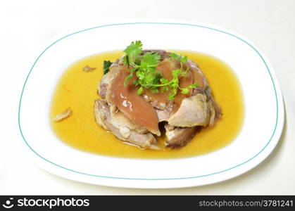 stewed pork knuckle with kale inside , chinese cuisine