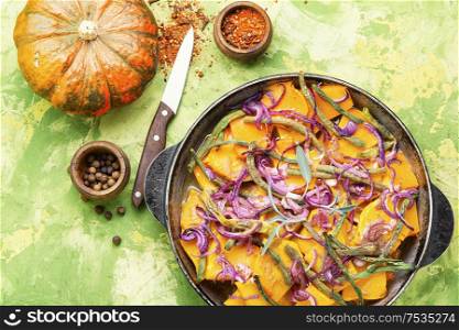 Stewed pumpkin with red onion and vigna.Baked vegetables. Roasted pumpkin with with vegetables