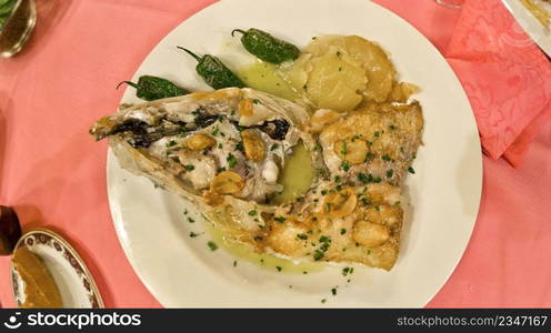 Stewed Sea Bass Spanish Cuisine at Restaurant