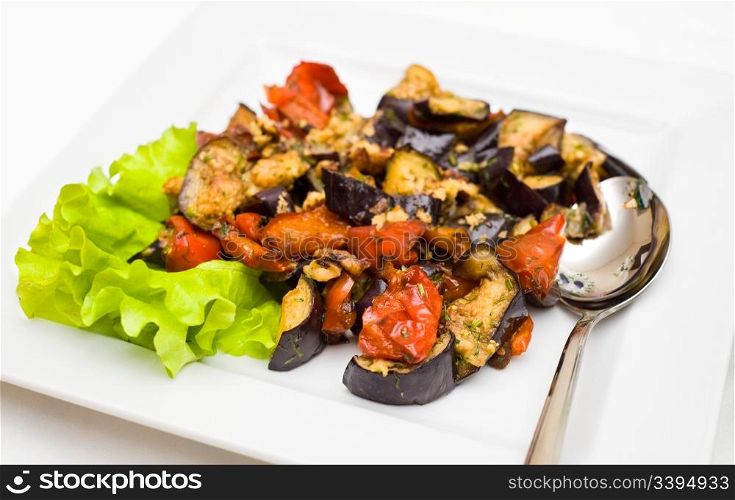 stewed vegetables - eggplants and tomatoes, served with lettuce