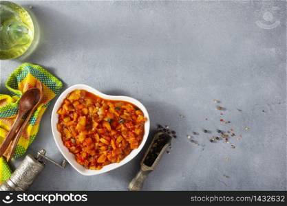 Stewed zucchini potatoes carrot and pepper with tomato sauce
