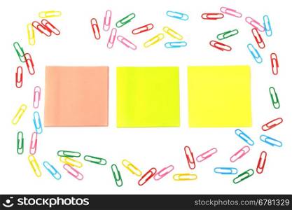 stickers and a set of paper clips isolated on white background