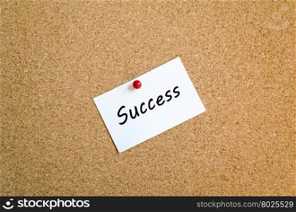 Sticky Note On Cork Board Background And Success Text Concept