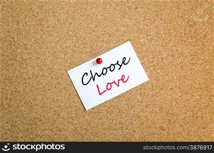 Sticky Note On Cork Board Background Choose Love concept
