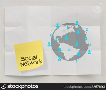 sticky note social network icon on crumpled paper background as concept