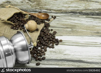 Still life coffee beans and coffee grinder.