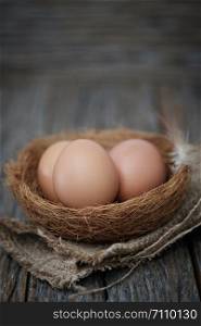 Still life-Eggs on nest arranged in a rustick scene, Egg is beneficial to the body, Food concept.
