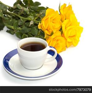 still life from a cup of coffee and yellow roses