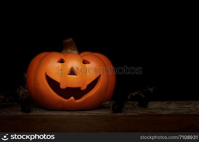 Still life Halloween pumpkin on black background. Halloween concept.