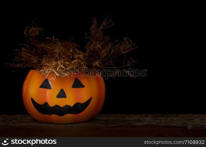 Still life Halloween pumpkin on black background. Halloween concept.