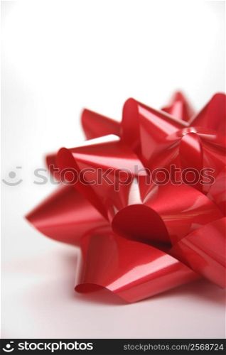 Still life of big red Christmas bow.
