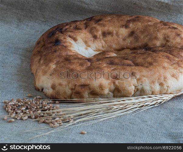 Still life of broken lavash, wheat sprouts and grains