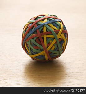 Still life of colorful rubber band ball.